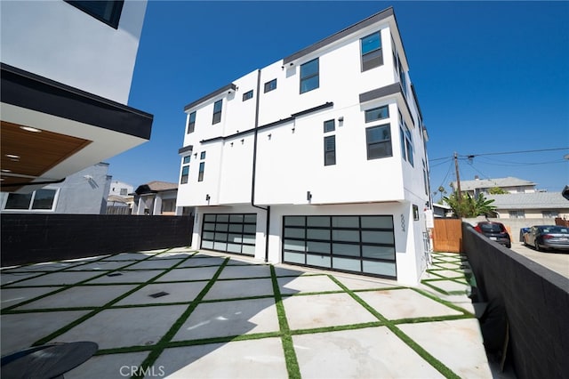 exterior space with a garage