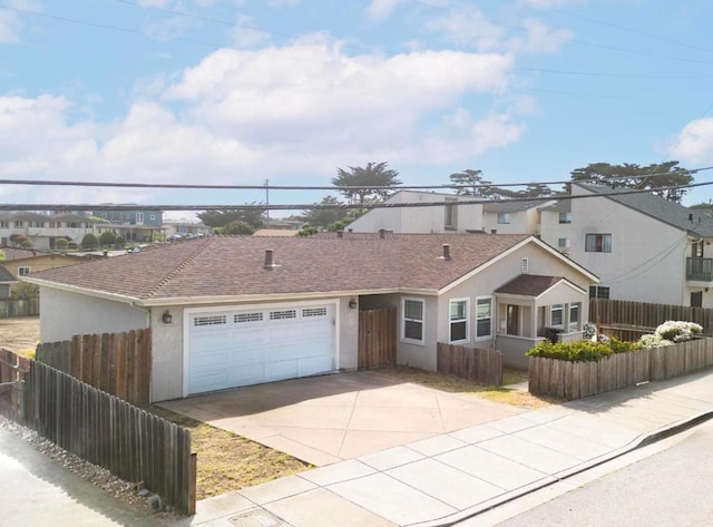 single story home featuring a garage