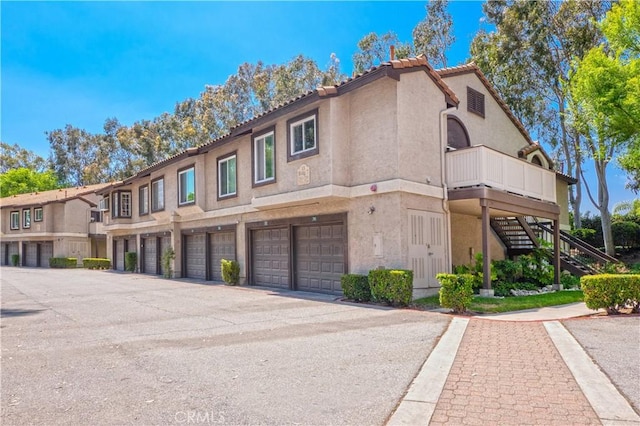 view of property featuring a garage