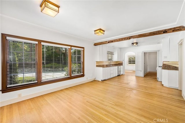 unfurnished living room with light hardwood / wood-style floors