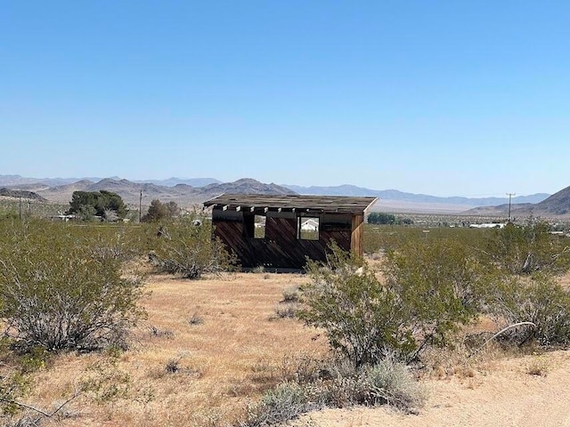 view of mountain feature featuring a rural view