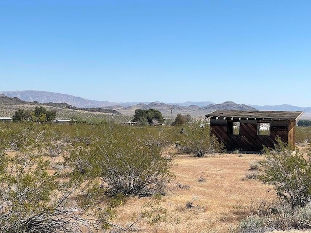 view of mountain feature featuring a rural view