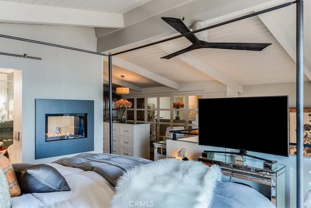 bedroom with lofted ceiling with beams and wood ceiling