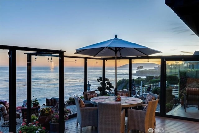 deck at dusk with a water view