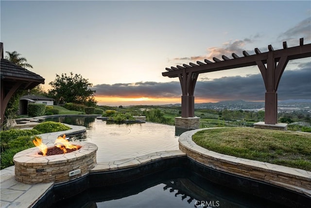 exterior space with a fire pit