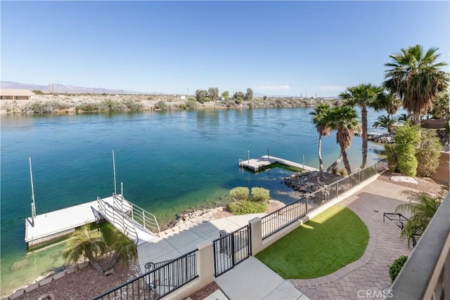 property view of water with a dock