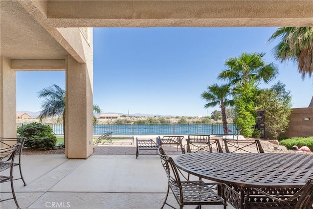 view of patio / terrace featuring a water view