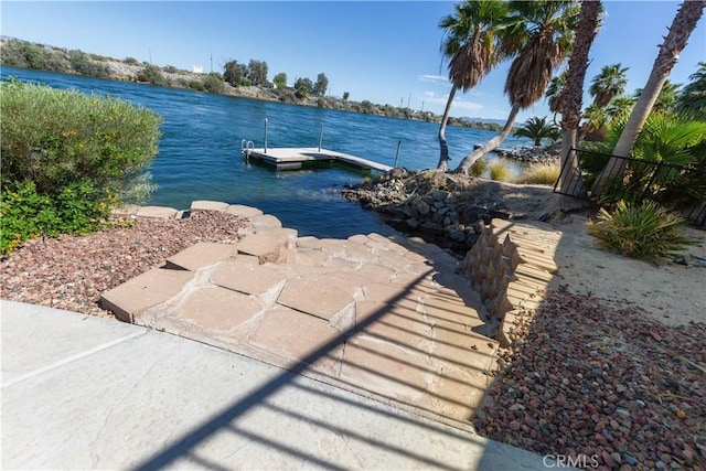dock area featuring a water view