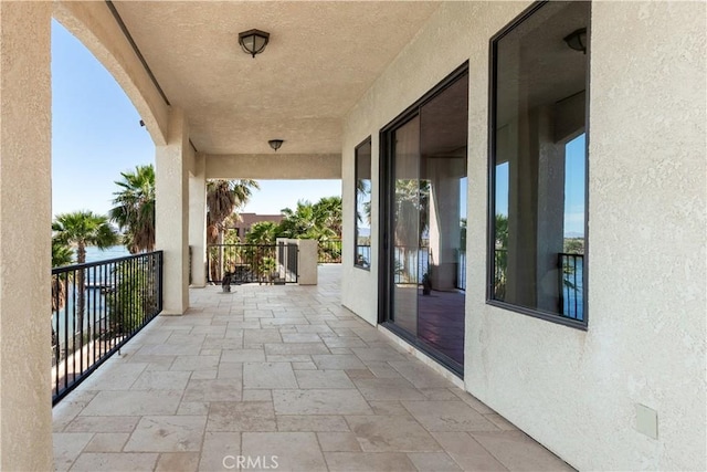 view of patio / terrace with a balcony