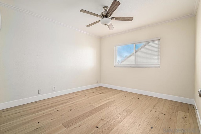 spare room with ceiling fan, light hardwood / wood-style floors, and ornamental molding