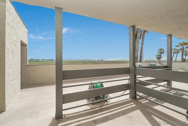 view of patio / terrace with a balcony