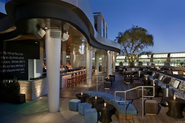 patio terrace at twilight with a bar