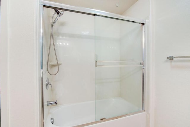 bathroom featuring enclosed tub / shower combo