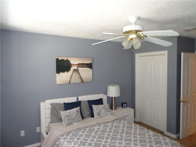 bedroom featuring ceiling fan