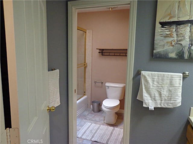 full bathroom with tile patterned flooring, vanity, enclosed tub / shower combo, and toilet