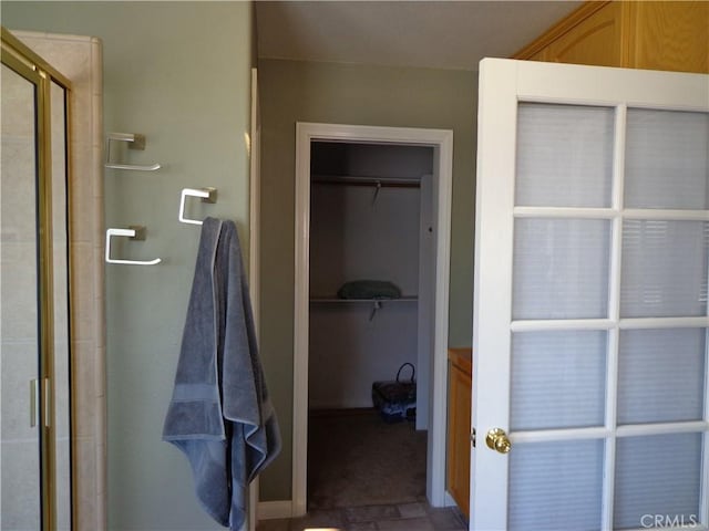 bathroom featuring walk in shower