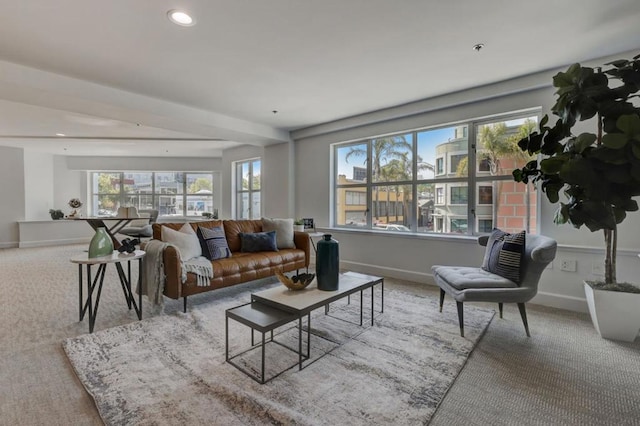 living room featuring light carpet