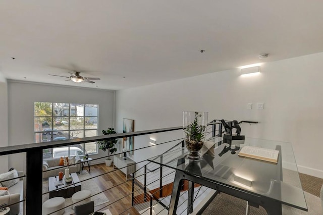 hallway featuring hardwood / wood-style flooring