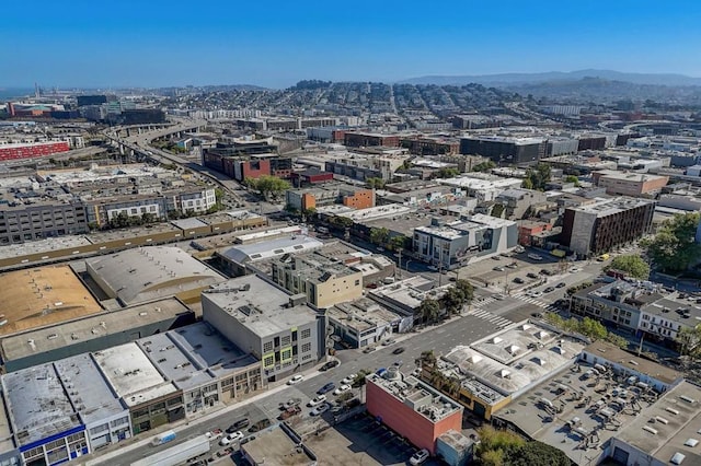 birds eye view of property featuring a mountain view