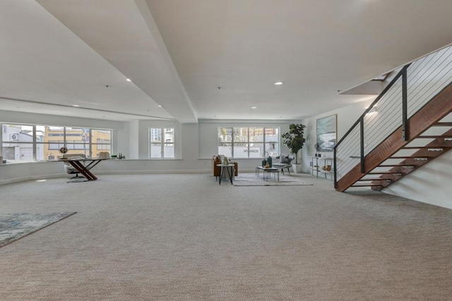 unfurnished living room featuring carpet flooring