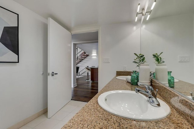 bathroom featuring tile patterned floors and vanity