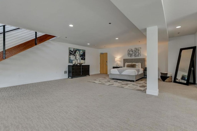 bedroom featuring light colored carpet