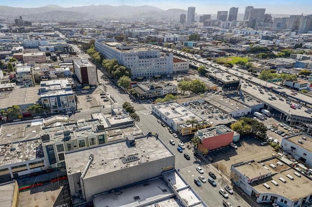 drone / aerial view featuring a mountain view