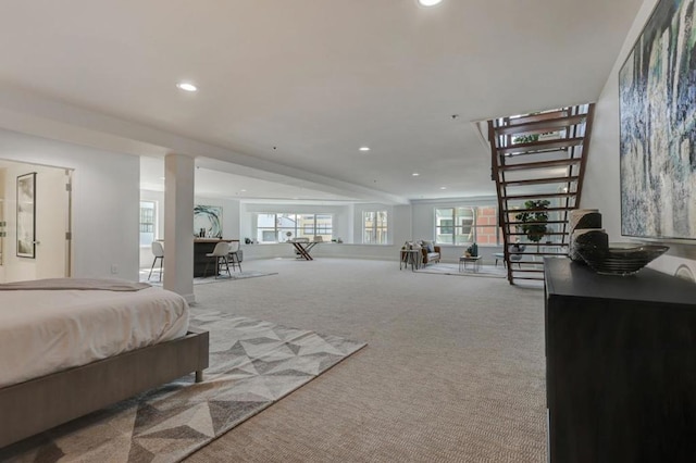 bedroom with light carpet