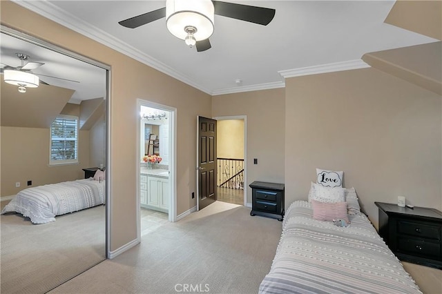 carpeted bedroom featuring ceiling fan, crown molding, and connected bathroom