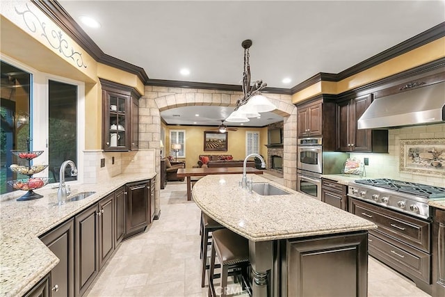 kitchen featuring tasteful backsplash, sink, and stainless steel appliances