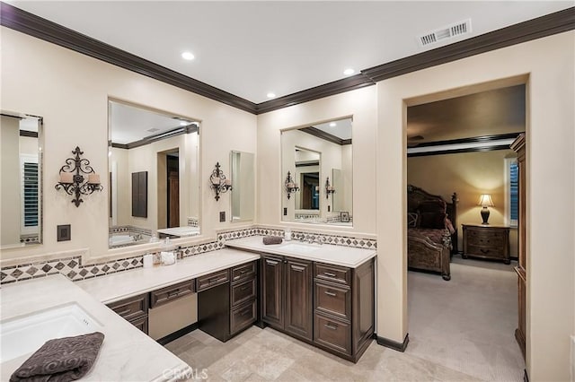 bathroom with vanity and ornamental molding