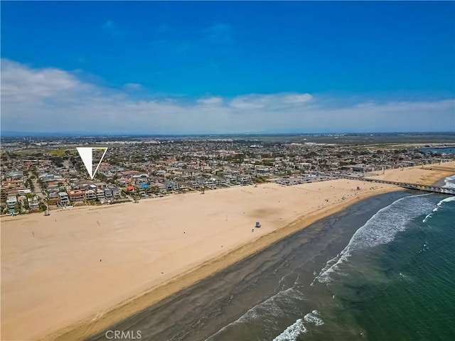 bird's eye view with a view of the beach and a water view