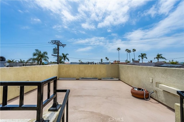 view of patio with a balcony