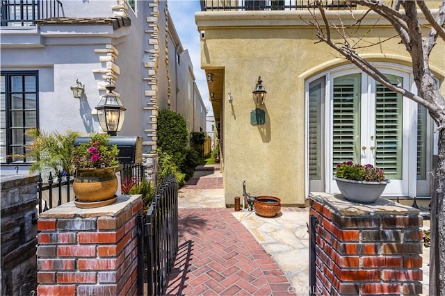 view of patio featuring french doors