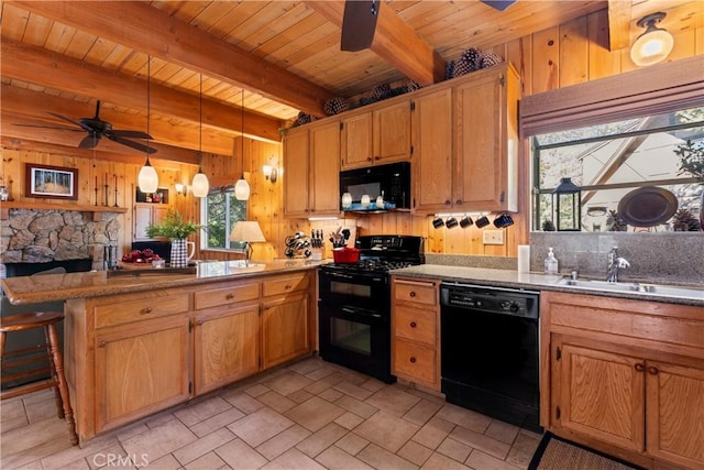 kitchen with black appliances, decorative light fixtures, sink, kitchen peninsula, and beam ceiling