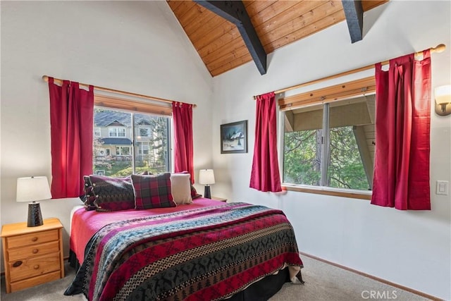 bedroom featuring wooden ceiling, carpet, and lofted ceiling with beams