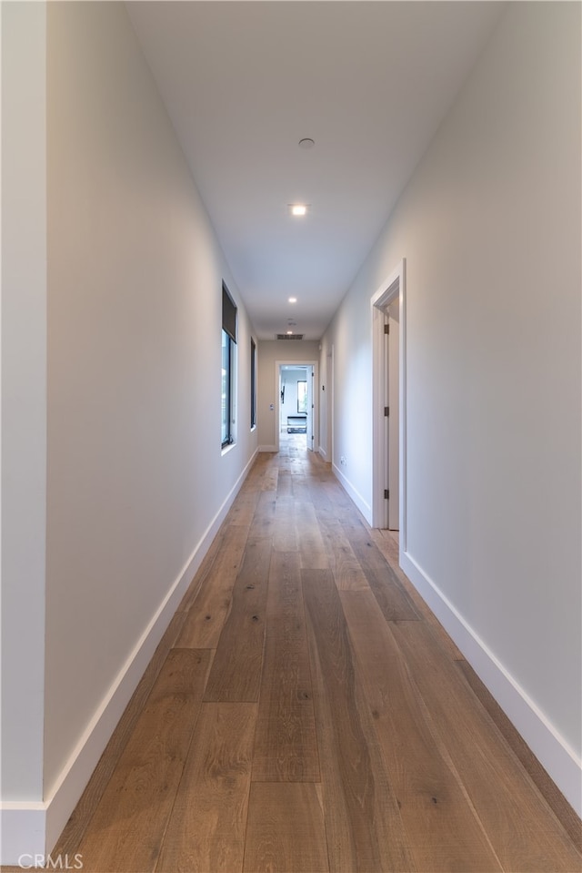 hall featuring hardwood / wood-style flooring