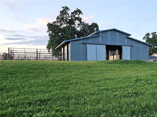 exterior space featuring a lawn