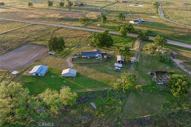 birds eye view of property featuring a rural view