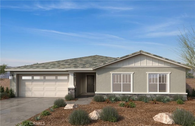 view of front of property with a garage