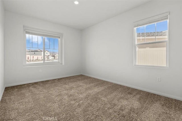 empty room with carpet floors