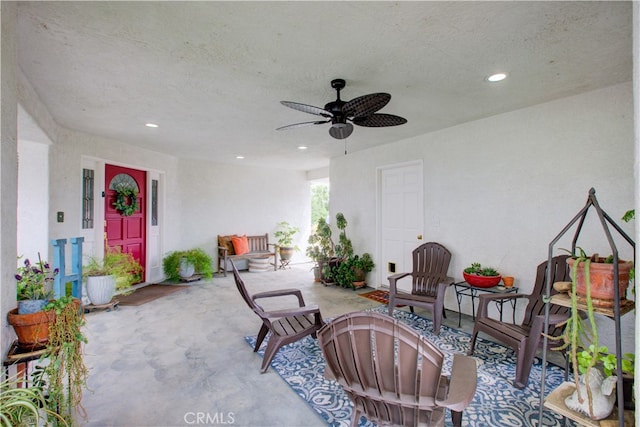 view of patio / terrace featuring ceiling fan