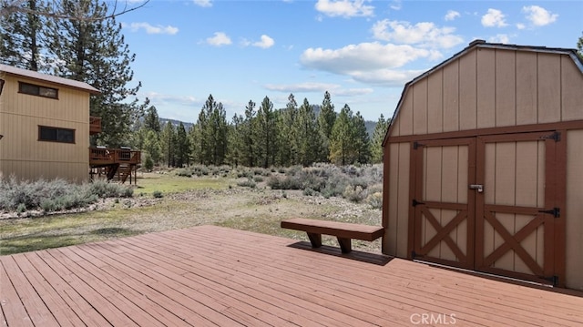 deck with a storage shed