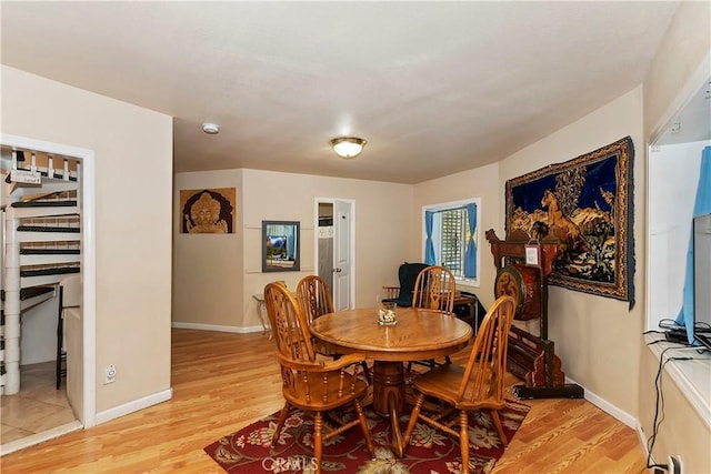 dining space featuring light hardwood / wood-style floors