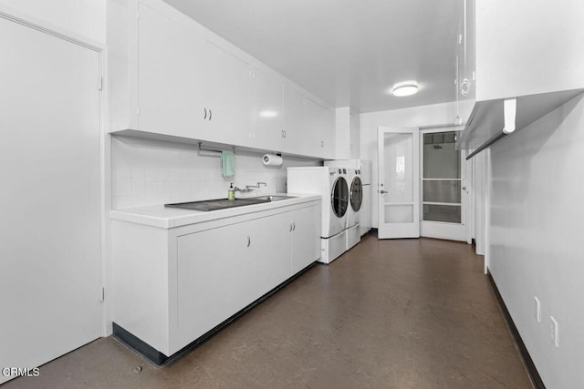 laundry area with separate washer and dryer