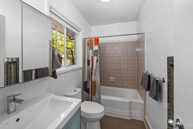 full bathroom featuring vanity, shower / bath combination with curtain, and toilet