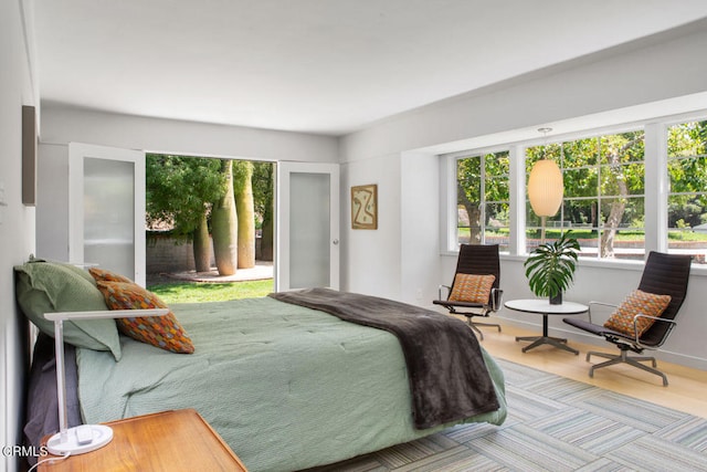 bedroom featuring hardwood / wood-style flooring