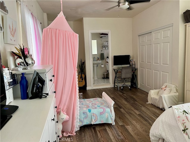 bedroom with a closet, ceiling fan, and dark hardwood / wood-style flooring