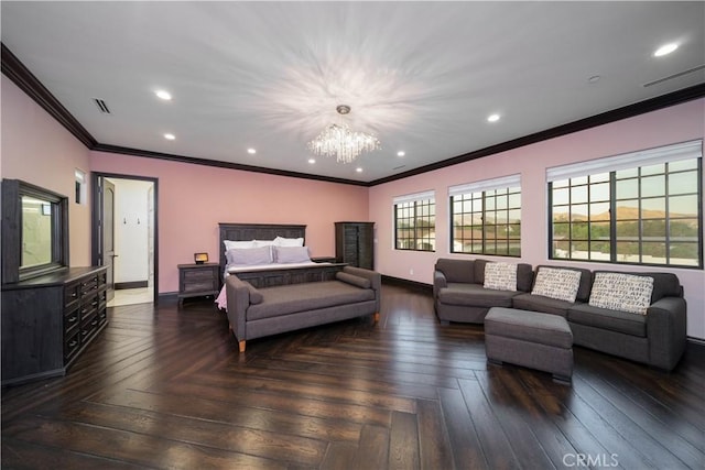 bedroom with dark parquet flooring, ornamental molding, and a chandelier