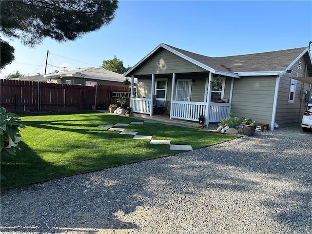 view of front facade with a porch and a front yard